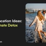 Sover Travel - Couple running through shallow ocean water towards a pier under a bright sky. The image promotes Sober Vacation Ideas: The Ultimate Detox by prescotthouse.com, inviting you to discover mindful travel experiences through wellness retreats.